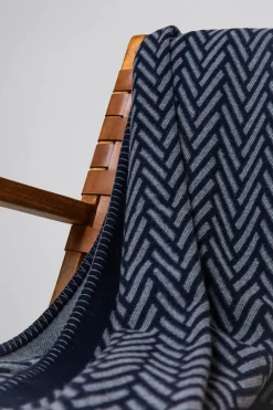 JOHNSTONS OF ELGIN HERRINGBONE JACQUARD BLANKET STITCHED THROW - NAVY/MID GREY